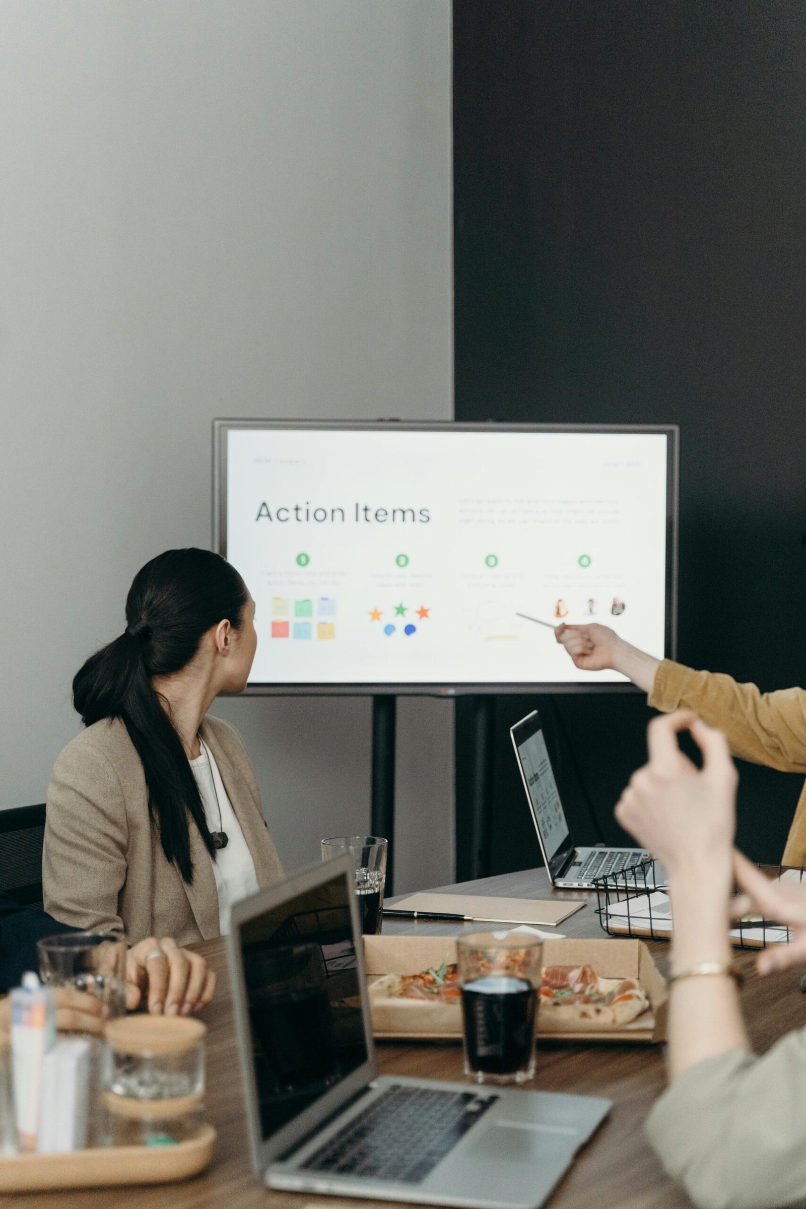 A person featuring a presentation to his colleagues